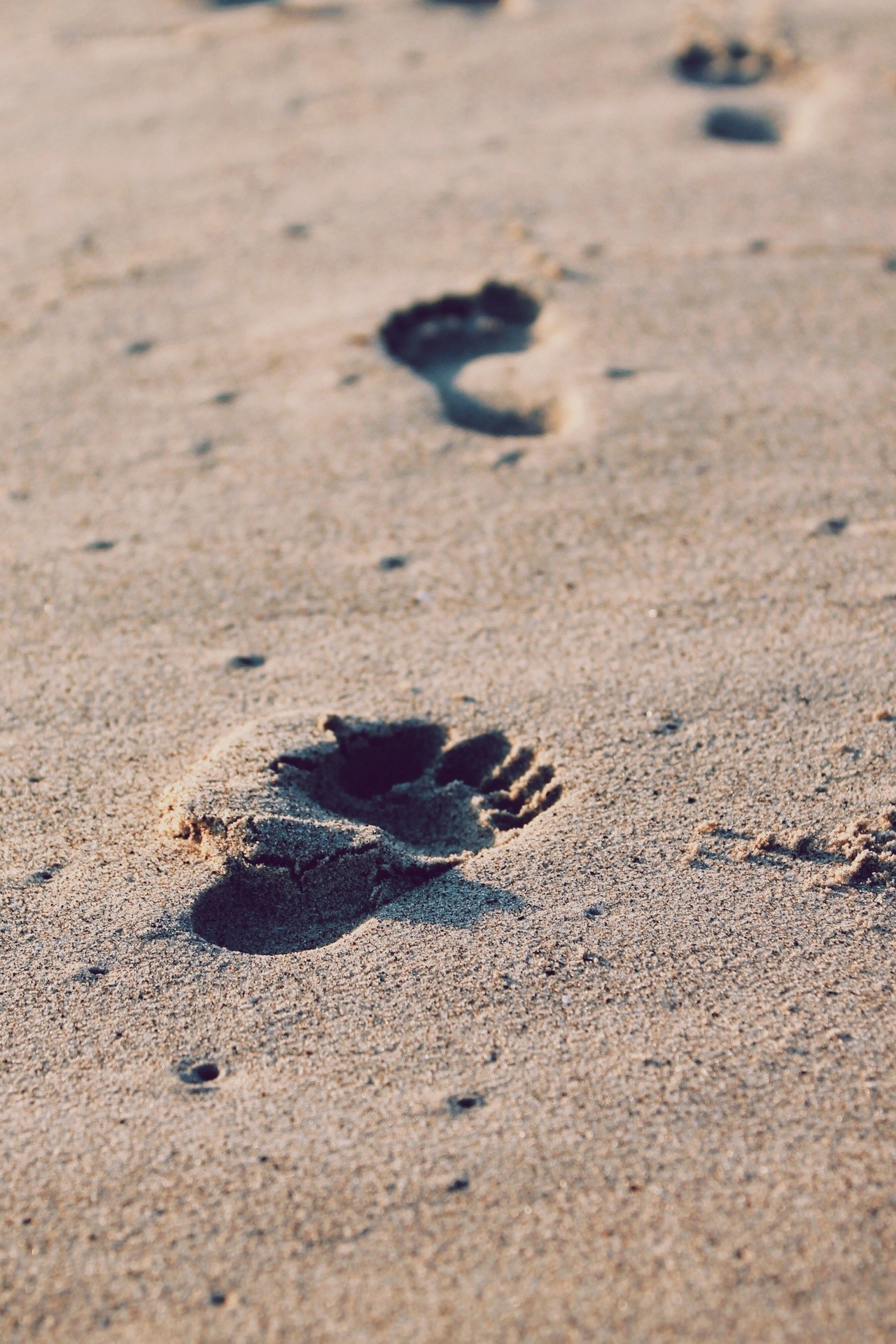 Steps in beach sand - steps to your goal